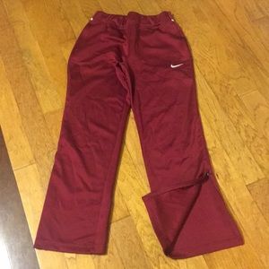 Maroon Nike athletic pants